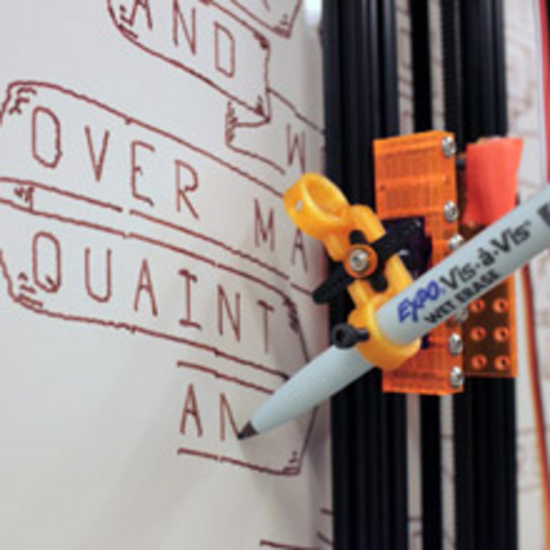 Vertical car is made of layered lasercut acrylic and uses a 3D-Printed pen holder.